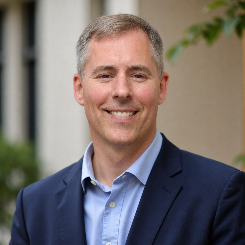 Dr. Ryan Ford, chiropractor in a white coat